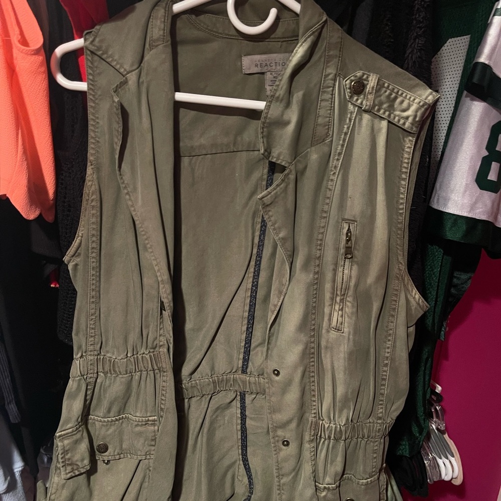 green denim vest